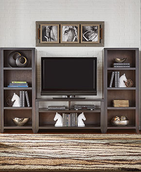 brown TV stand with bookshelves